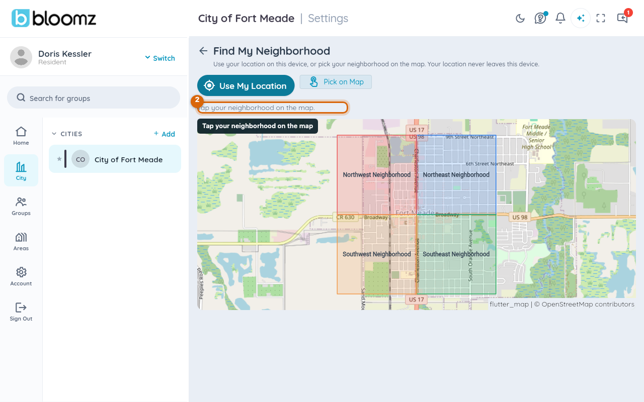 The Pick on Map screen with color-coded neighborhoods and a hint to tap yours
